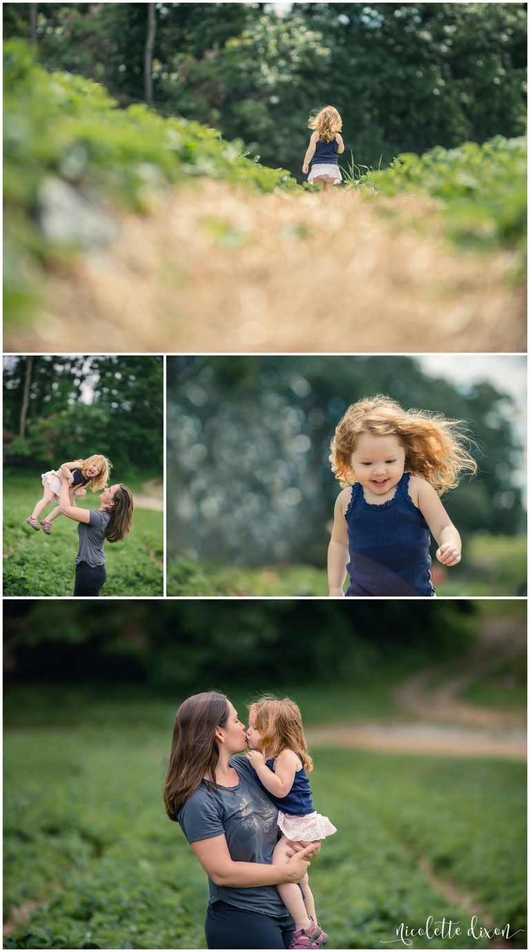 Pittsburgh Photographers Family | Mom kissing daughter in strawberry field at Simmons Farm near Pittsburgh