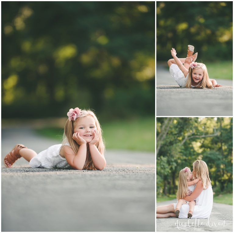 Girl laying down on road near Pittsburgh