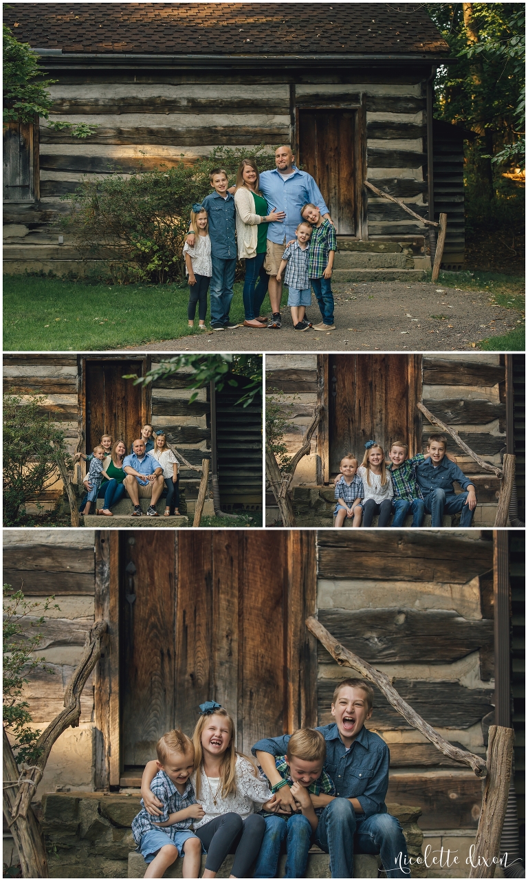 Family standing in front of cabin at Robin Hill Park in Moon Township near Pittsburgh