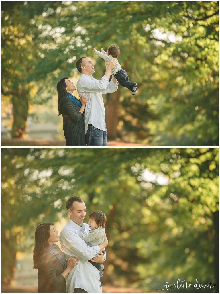 Father holding up his son in Mellon Park near Pittsburgh