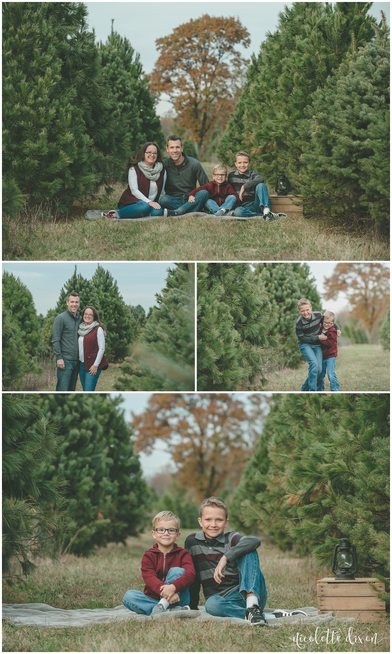 Family sitting on ground at Allison's Christmas Trees near Pittsburgh