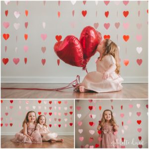 Little Girl Holding Valentine's Day Balloons