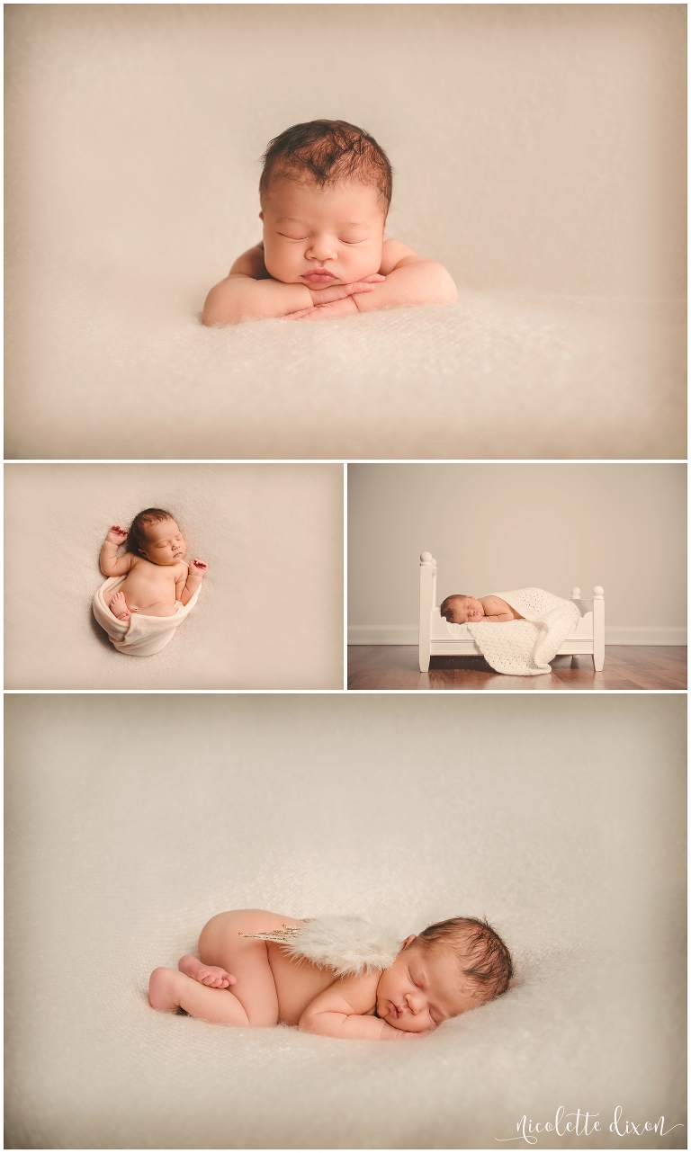 Newborn baby girl laying on light pink blanket in photography studio in Moon Township near Pittsburgh