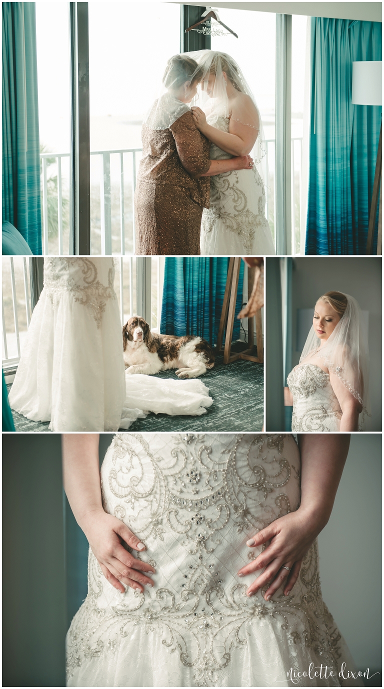 Bride and her mother looking at each other under the wedding veil