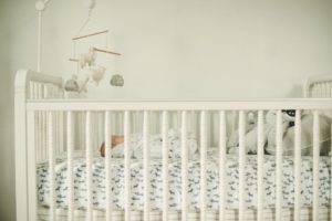 Newborn baby boy laying in crib in home in Coraopolis near Pittsburgh