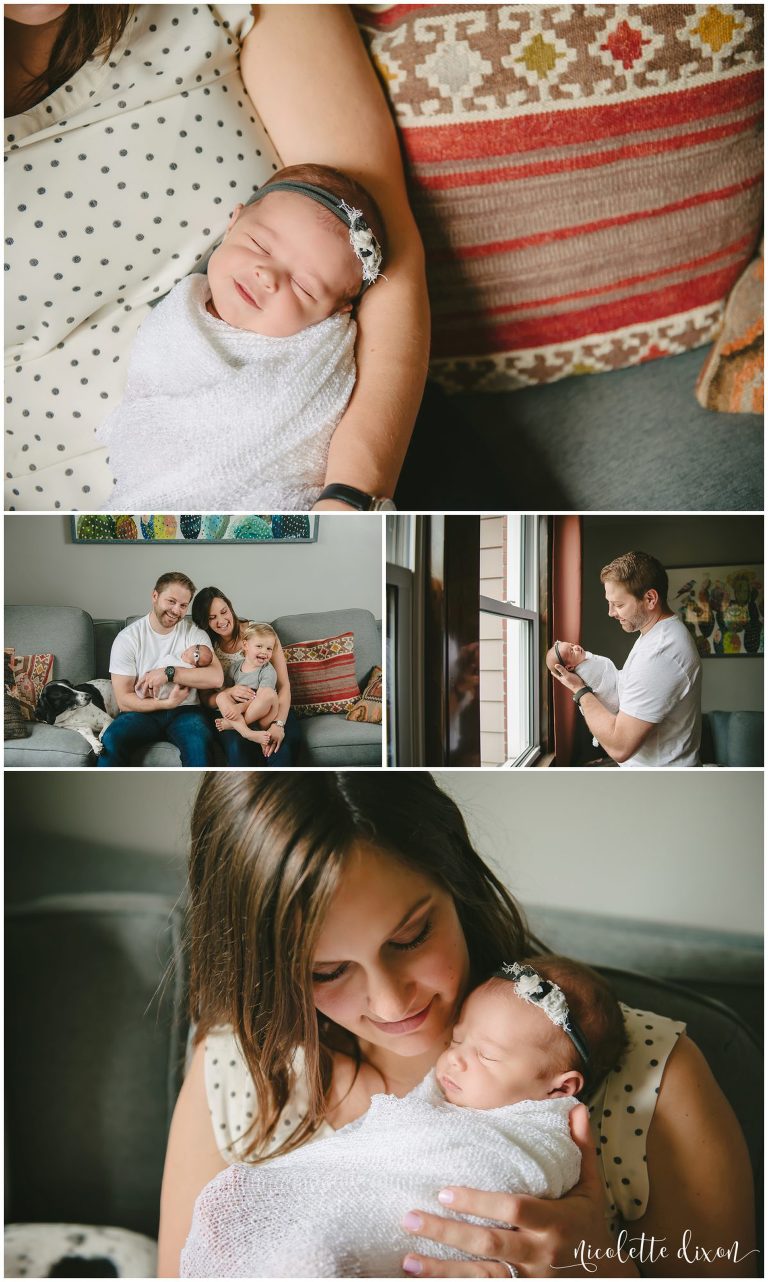 Mom holding newborn baby girl on couch in home in Pittsburgh 