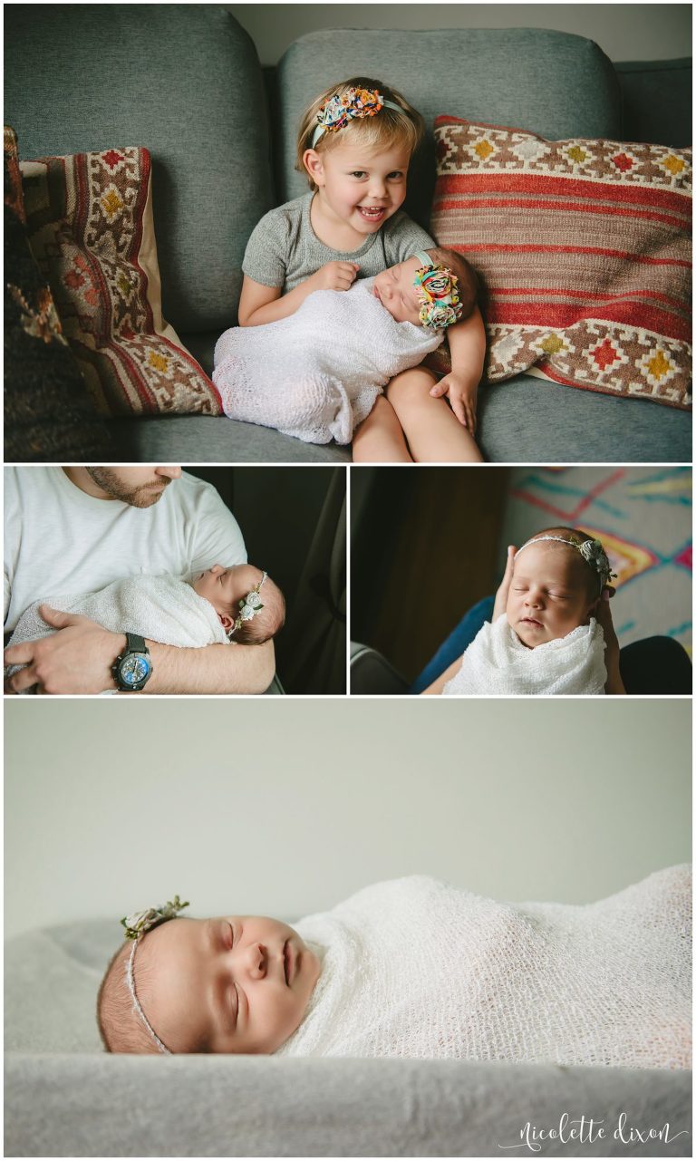 Sister holding newborn baby girl in home in Pittsburgh