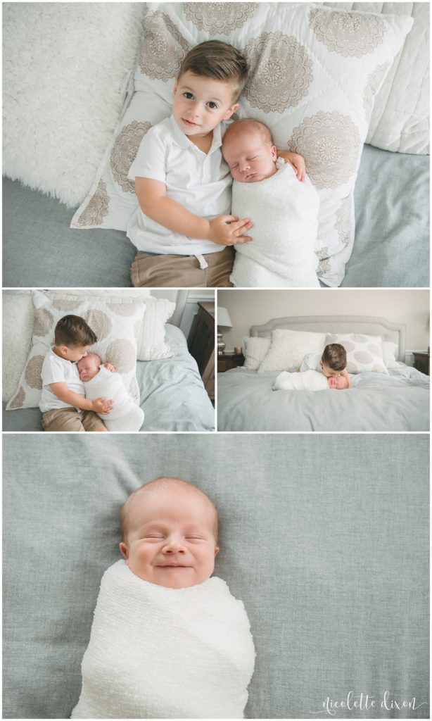 Picture of big brother holding newborn baby boy in home in South Fayette near Pittsburgh