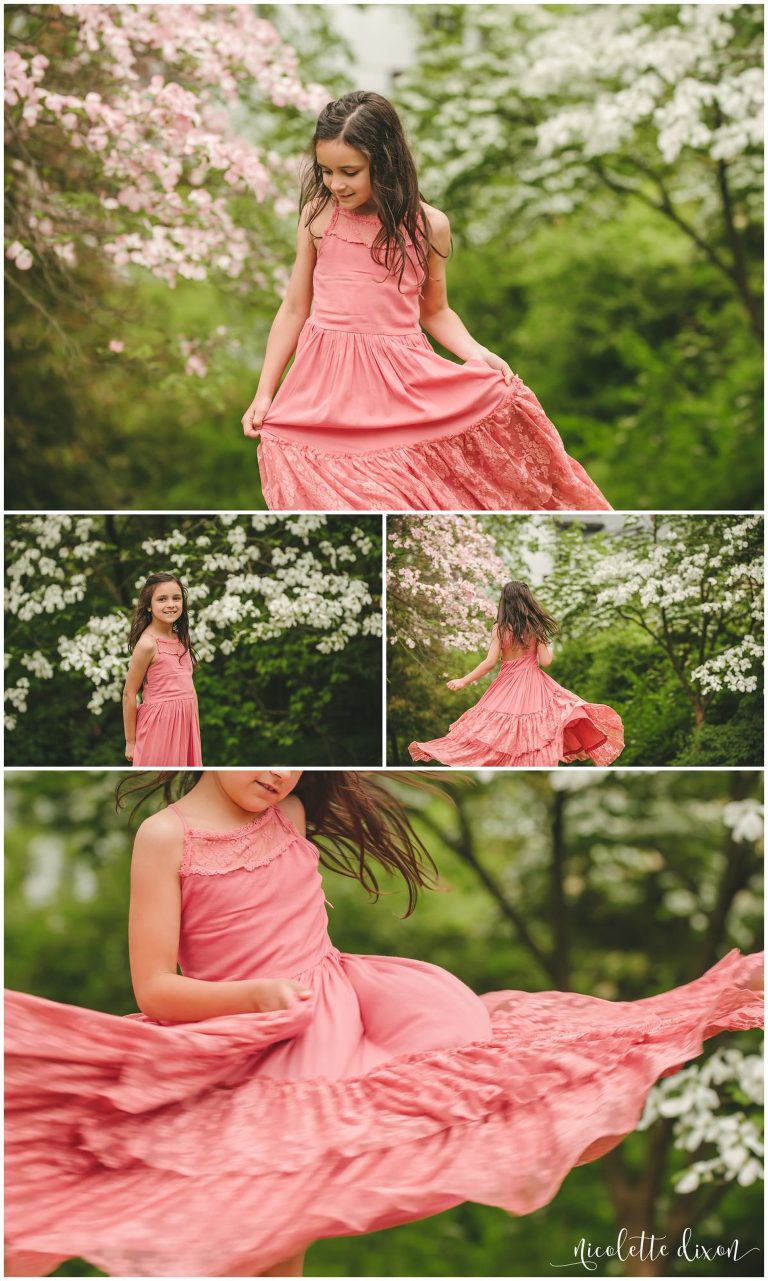 Child spinning around in pink dress at Mellon Park near Pittsburgh 