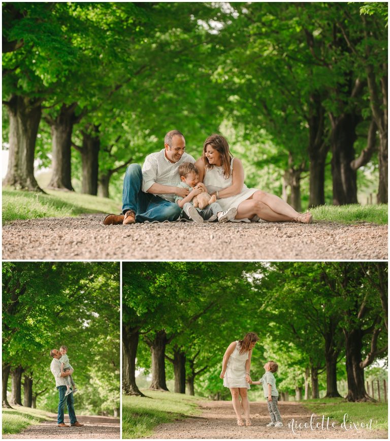 Family of three surrounded by trees in natural light at Round Hill Park near Pittsburgh