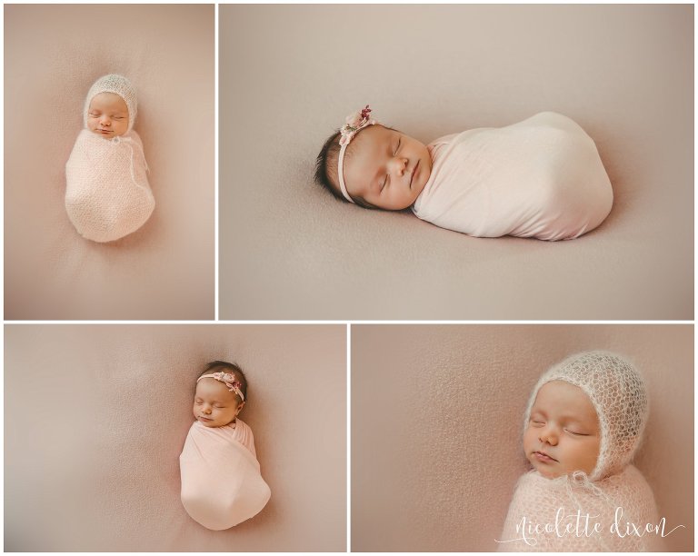 Infant baby girl posed and sleeping among soft blanket near Pittsburgh