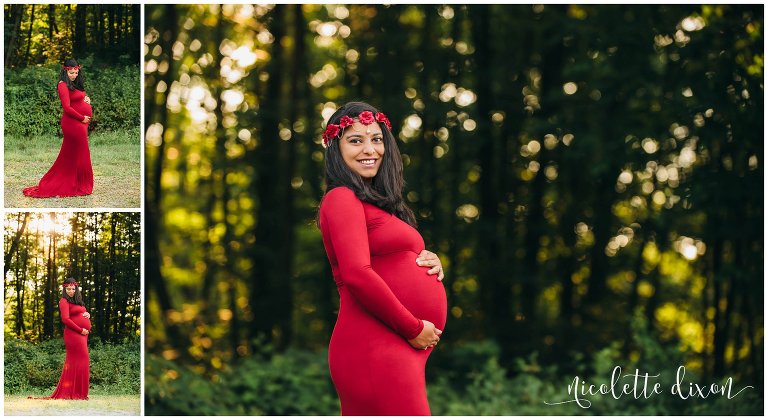 Pregnant mom poses in front of a forest at Moraine State Park near Pittsburgh