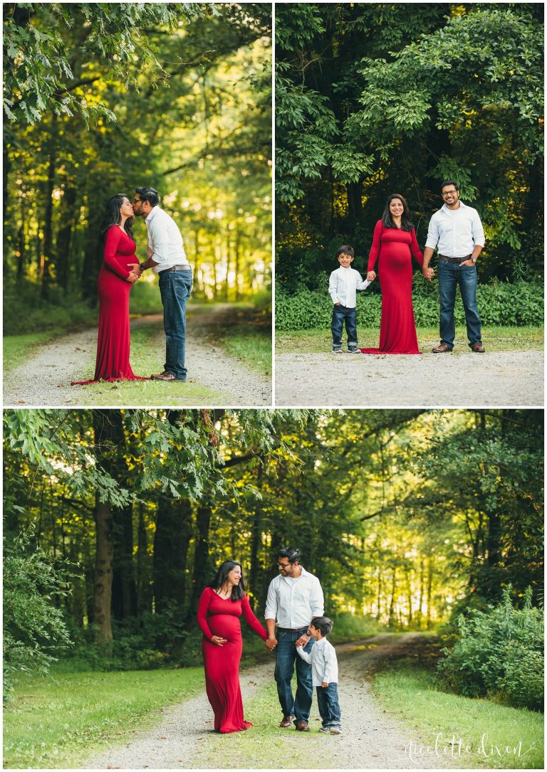 Pregnant woman kissing husband and posing with family in Moraine State Park near Pittsburgh