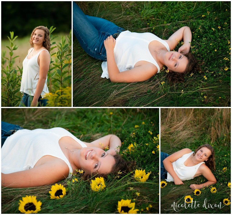 Moon Township senior girl lays in grass surrounded by sunflower at Sewickley Heights Borough Park near Pittsburgh