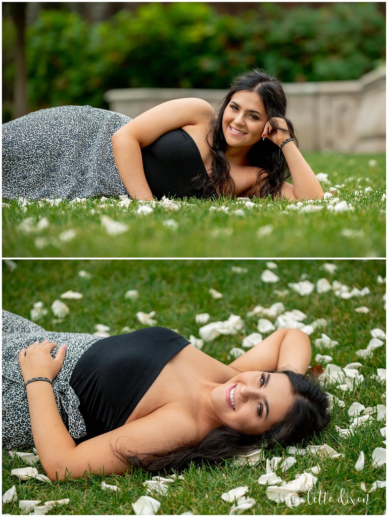 High School Senior Girl Laying on Ground with White Roses in Greensboro NC