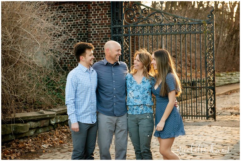 Family laughing at each other at Mellon Park near Pittsburgh PA