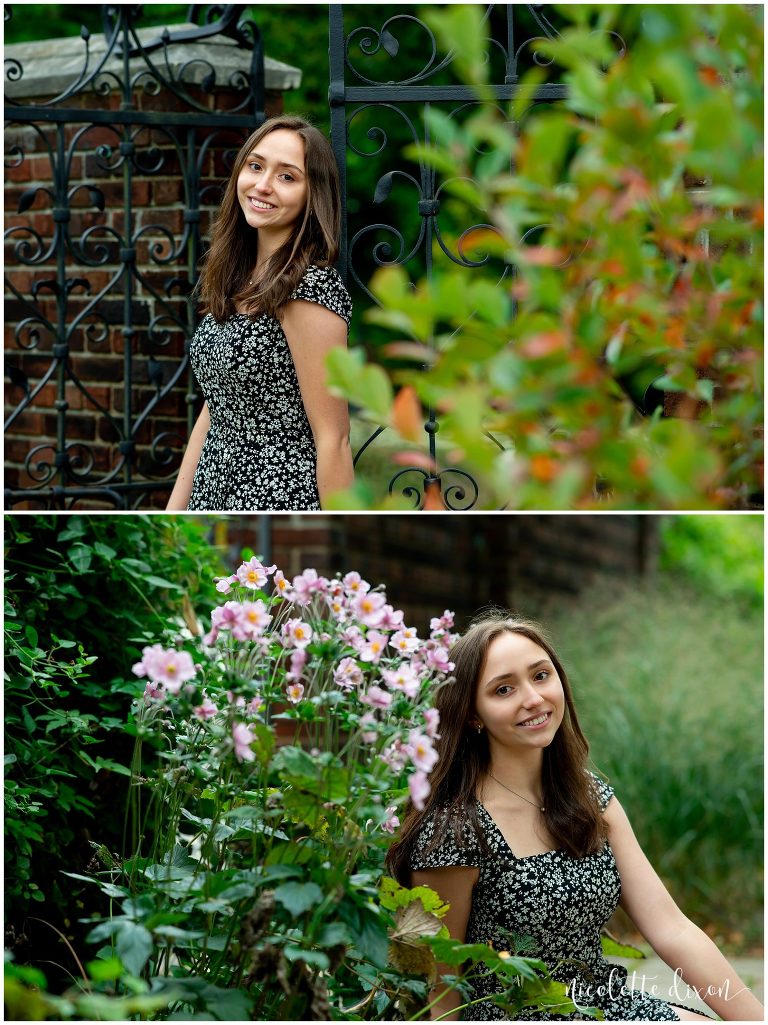 High school senior girl standing next to flowers in Mellon Park near Pittsburgh