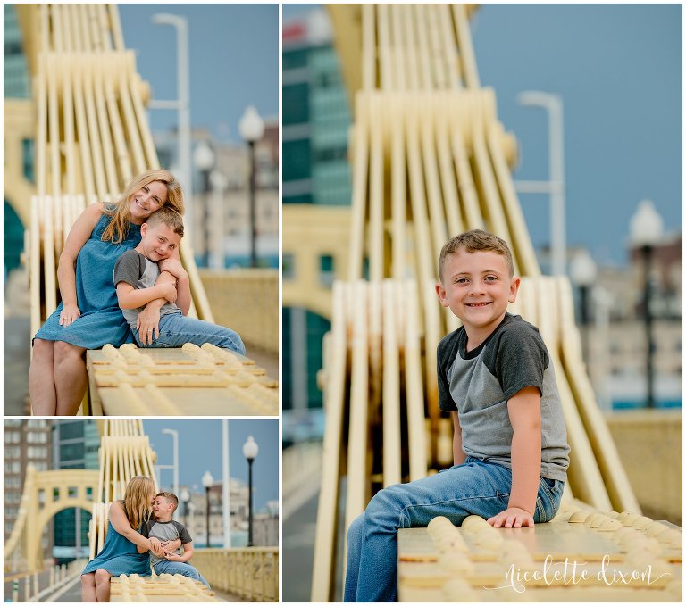Boy Sitting on Roberto Clemente Bridge in Downtown Pittsburgh 
