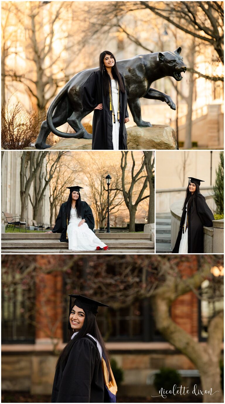 College graduate taking pictures in graduation gown by panther statue at University of Pittsburgh campus