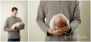 Dad holding newborn baby in studio in North Fayette Township near Pittsburgh.