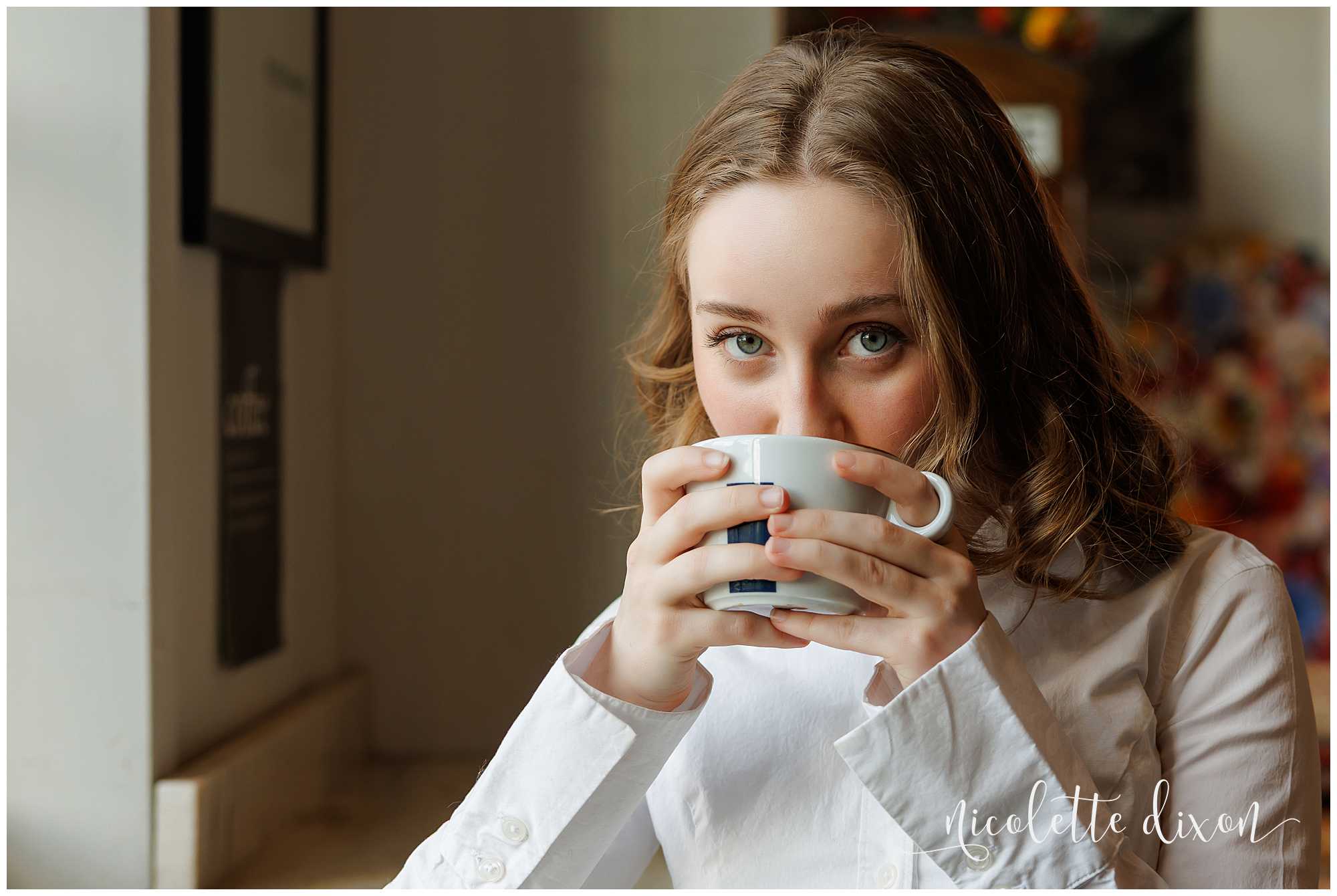 High School Senior Girl Sipping Coffee at Carnegie Coffee Company in Carnegie near Pittsburgh PA