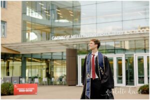 College Graduate Looking to the Side in Front of Tepper School of Business at Carnegie Mellon University in Pittsburgh PA