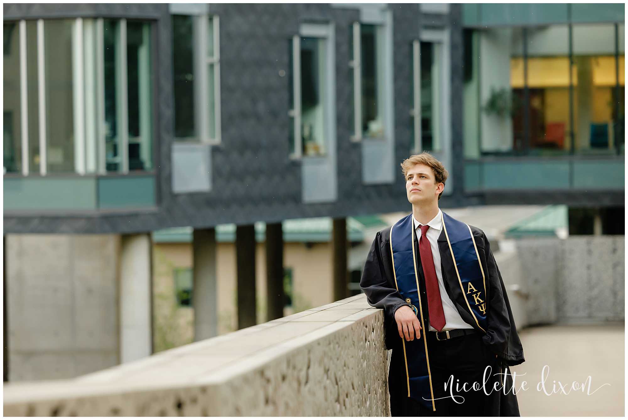 College Graduate Leaning Against Railing at Carnegie Mellon University in Pittsburgh PA
